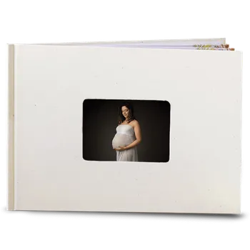 Fotokniha Fotokniha online. Skvělá akce na fotoknihu A4 na šířku a desky přírodní - motiv elegantní černá