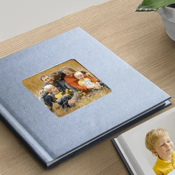 Fotokniha Nejlepší VELKÁ foto-kniha a kvalita pro vzpomínky. Desky modré - motiv kytičky