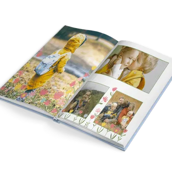 Fotokniha Fotokniha levně. Vaše nejlepší foto kniha A4 výšku v barvě modré - motiv kytičky