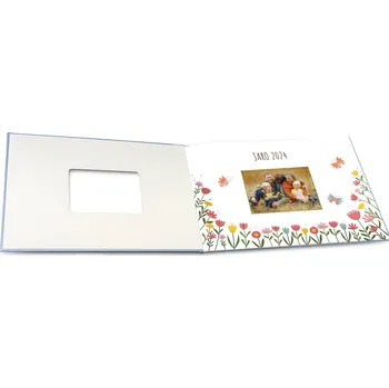 Fotokniha Fotokniha levně. Vaše nejlepší foto kniha A4 šířku v barvě modré - motiv kytičky