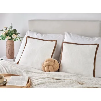 Bytový textil Sada 2 polštářů krémově bílá dekorativní bavlněné 45 x 45 cm rozptylové polštáře set 2 ks doplňky dekorace Beliani