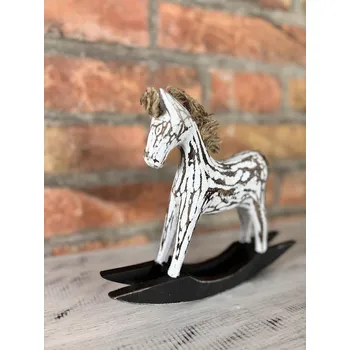 Obraz Dřevěný bílý houpací koník