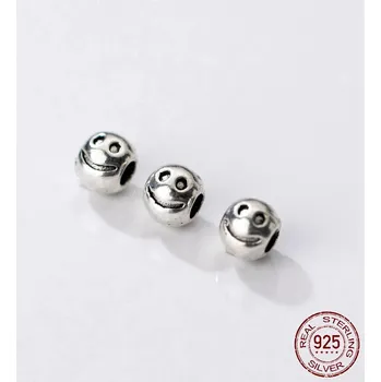 Korálek Usmívající se korálek 4,3 x 3,8 mm, stříbro 925/1000