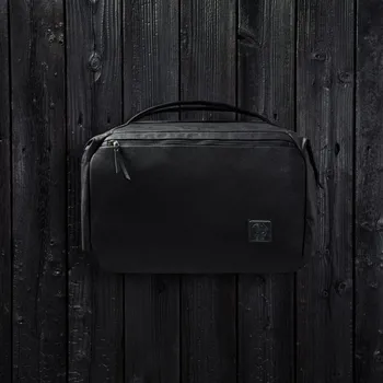 Cestovní taška Evergoods x Carryology Transit Duffel 35l Griffin Edition waxed cotton black