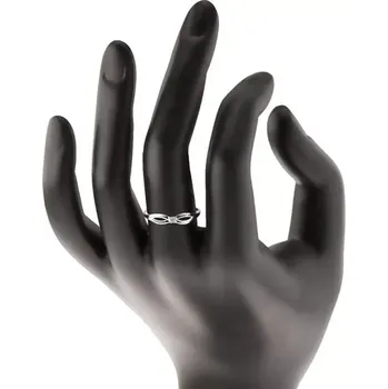 Prsten Prsten v bílém 14K zlatě s čirým zářivým briliantem, lesklá ramena s výřezy - Velikost: 50