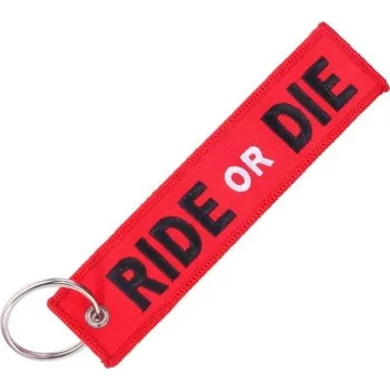 Lanyardy REMOVE BEFORE FLIGHT - přívěsek vytkaný na míru Cenové rozmezí: 5000 - 9999 ks, Technologie tisku: Tkaní přívěsek vytkaný na míru