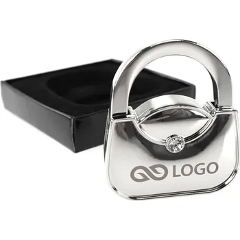 Věšák LADY - zavěąení kabelky s gravírem Cenové rozmezí: 100 - 299 ks zavěąení kabelky s gravírem