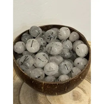 Křišťál s turmalínem tromlovaný