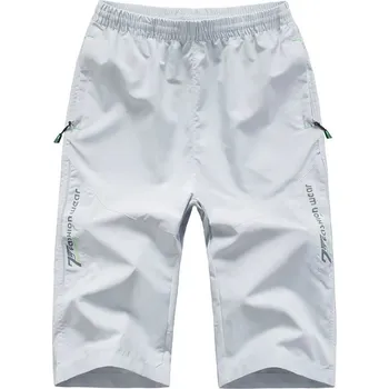 Pánské sportovní kraťasy rychleschnoucí s kapsami na zip Barva: Stříbrná, Velikost: 3XL