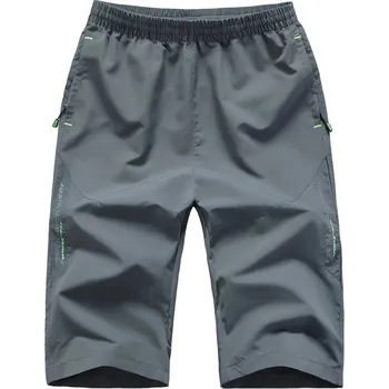 Pánské sportovní kraťasy rychleschnoucí s kapsami na zip Barva: Šedá, Velikost: 6XL