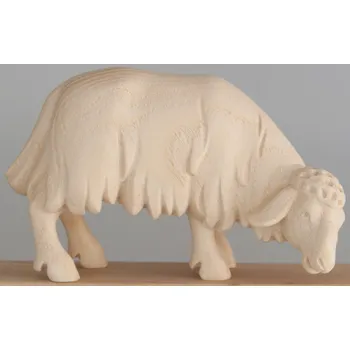 Vánoční dekorace Ornatis Ovce pasoucí se Provedení: Přírodní bez malování, Velikost stojících figur dospělých postav: 15 cm Dřevěná vyřezávaná soška ovce pasoucí se