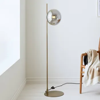 Lampička Markslöjd Stojací lampa Dione, mosazná/kouřově šedá, sklo, železo mosaz, kouřově šedá 1 x 40 W - Doprava zdarma