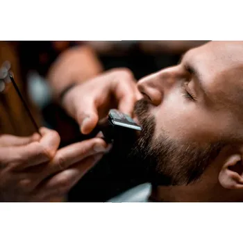 Plakát Plakát, Obraz - Man getting his mustache shaped by, EXTREME-PHOTOGRAPHER