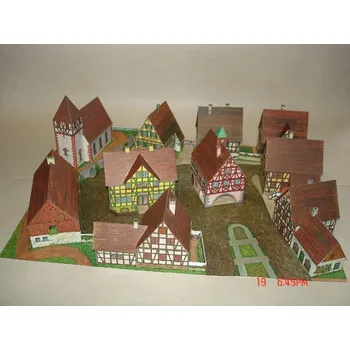 Modelová železnice vesnice s domy živnostníků papírová stavebnice Jordan 600
