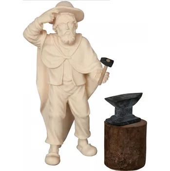 Vánoce Ornatis Kovář s kladivem u kovadliny Provedení: Přírodní bez malování, Velikost stojících figur dospělých postav: 14 cm Dřevěná vyřezávaná soška kováře s kladivem u kovadliny