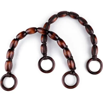 Ucha na tašky z dřevěných válečků