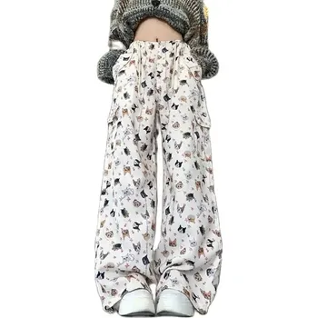 Široké dámské tepláky s potiskem psů Barva: Béžová, Velikost: L