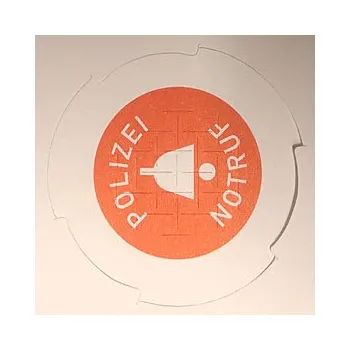 Perforovaný papír tísňového tlačítka ND100-GL indikující aktivaci