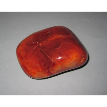 Masážní kámen KARNEOL TROMLOVANÝ masážní - Madagaskar, cca 6 cm, 120 - 150 g