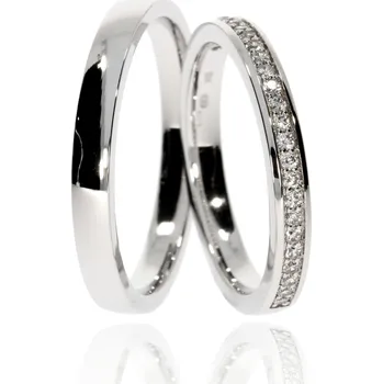 Prsten Zlatnictví Helios Zlaté snubní prsteny L-281/B Kameny: Se Zirkony