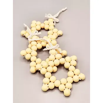 Vánoční ozdoba Kateřina Vlasáková vánoční hvězda z dřevěných korálků přírodní