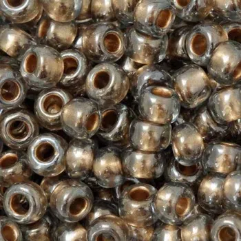 Korálek TOHO Co., Ltd. TOHO Round 6/0 Gold/Black Diamond Lined