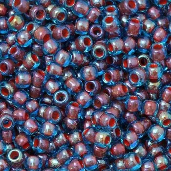Korálek TOHO Co., Ltd. TOHO Round 11/0 Aquamarine Lined Oxblood