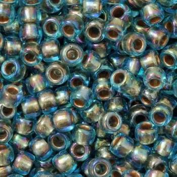 Korálek TOHO Co., Ltd. TOHO Round 8/0 Gold Rainbow Aqua Lined