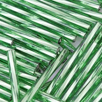 Korálek Preciosa Preciosa® Rokajl tyčinky kroucené 25mm peridot (57120)