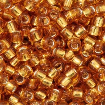 Korálek TOHO Co., Ltd. TOHO Round 8/0 Silver/Topaz Lined