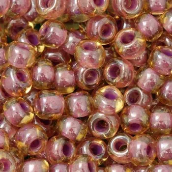Korálek TOHO Co., Ltd. TOHO Round 6/0 Lt Topaz/Pink Lined