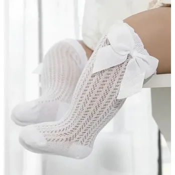 Ažurové ponožky s mašličkami Barva: Bílá, Velikost: 12-24M