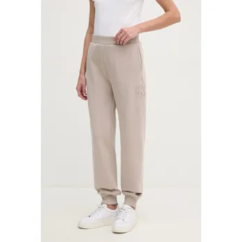 Tepláky Calvin Klein Jeans J20J224841 béžová 80X, vel. M