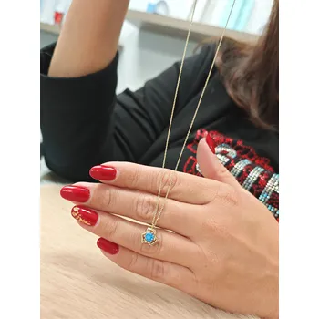 Řetízek Zlatý řetízek s přívěskem s modrým kamenem 2,35 g Délka řetízku: 50 cm, Ryzost: 14kt (585/1000)