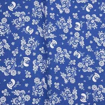Tegatex Folklorní látka metráž -folklorní květy na modrém