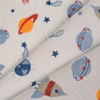 Látka mušelín / dvojitá gázovina Bella bílá rakety a planety