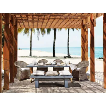 Zahradní sestava Zahradní jídelní souprava přírodní betonový stůl 4 ratanové židle s bavlněnými podsedáky Beliani