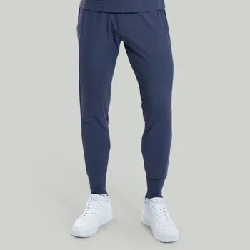 Pánské kalhoty GymBeam Sportovní kalhoty ULTRA Graystone - STRIX Velikost: M, Barva: modrá