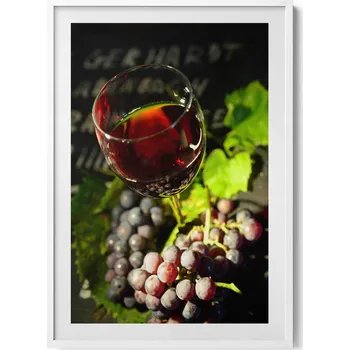 Obraz Elegantní obraz do obýváku Sklenice červeného vína a hroznové víno 70x100 cm