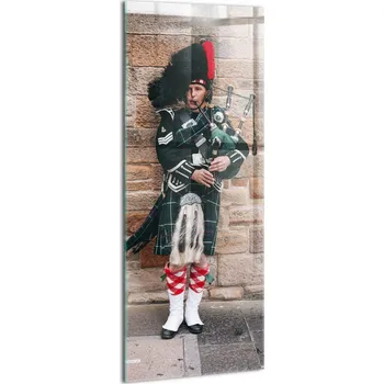 Obraz Skleněný Foto Obraz do Předsíně Dekorativní - Hudebník hrající na dudy