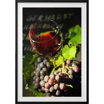Obraz Nástěnný obraz černý rám Sklenice červeného vína a hroznové víno 70x100 cm