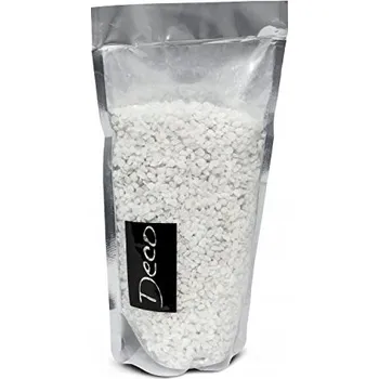 Obraz Okrasné kameny Granulát štěrk dekorace substrát akvárium les ve sklenici bílá