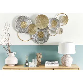 Obraz Nástěnná dekorace zlatá a stříbrná kovová 110 x 60 cm ve tvaru kruhů přírodní design moderní boho doplňky do interiéru Beliani