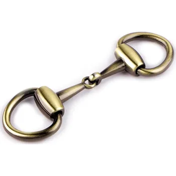 Kovová spona ke zdobení oděvů, šátků a doplňků