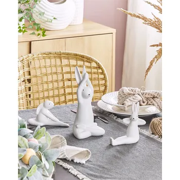 Velikonoční dekorace Sada 3 dekorativních figurek bílých velikonoční zajíčci keramika ručně vyrobeno stolní dekorace Beliani