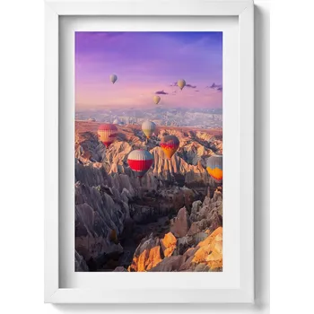 Obraz Nástěnný obraz v bílém rámu s grafikou Balóny letící nad kaňonem 20x30 cm