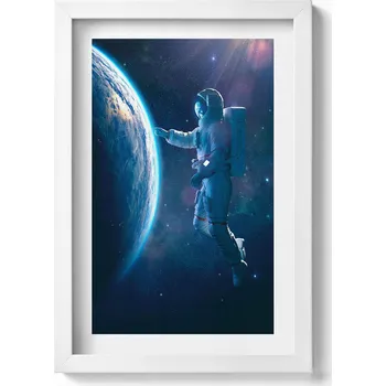 Obraz Dekorativní nástěnný obraz v bílém rámu Kosmonaut a planeta Země 20x30 cm