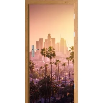 Fototapeta POHLED NA MĚSTO PALMY DEKORATIVNÍ FÓLIE NA DVEŘE