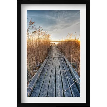 Obraz Ozdobný nástěnný obraz v černém rámu Dřevěná cesta mezi trávou 40x60 cm