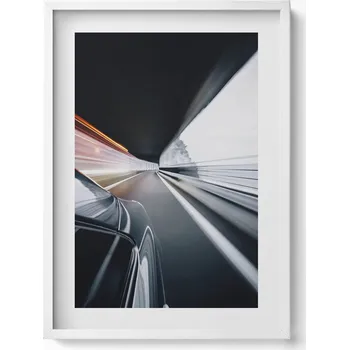 Obraz Dekorativní nástěnný obraz v bílém rámu do obýváku Jedoucí auto v ulici 50x70 cm